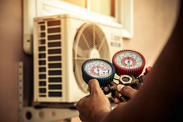 Professional Ductwork Repair technician working in Mansfield Center, MA